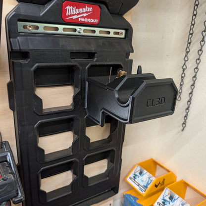 Milwaukee M18 inflator secured on PACKOUT-compatible holder