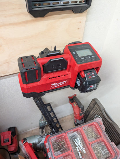 M18 inflator wall mount showing integrated accessory storage