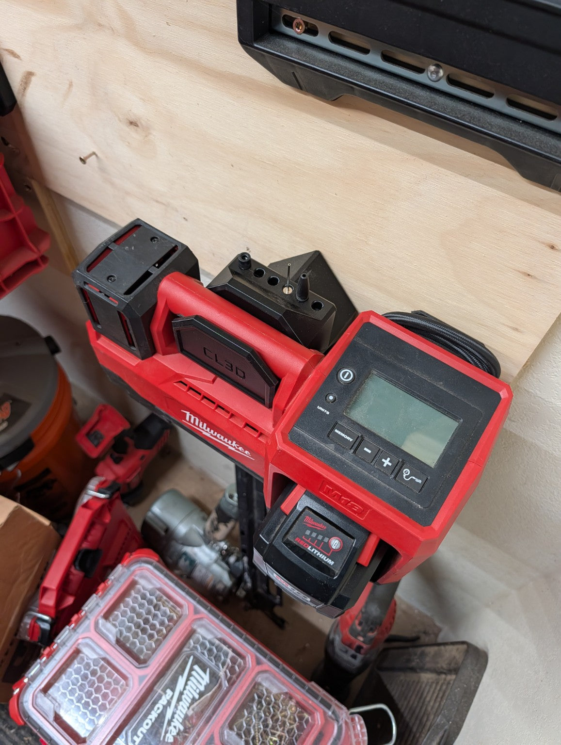 Angled view of Milwaukee M18 inflator secured in ClearLine3D mount
