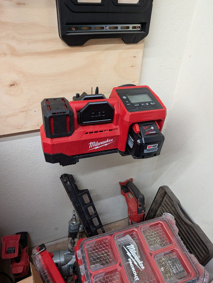 Milwaukee M18 inflator mounted on a shop wall using ClearLine3D holder